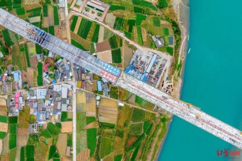 会东网资讯:沿江高速宁攀段关键大桥贯通,向6月底通车目标迈进插图1 会东网资讯:沿江高速宁攀段关键大桥贯通,向6月底通车目标迈进插图1