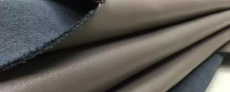 牛二层皮覆膜的真相:喷涂或覆上PVC的工艺解析-会东网